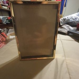 2 gold and black frames